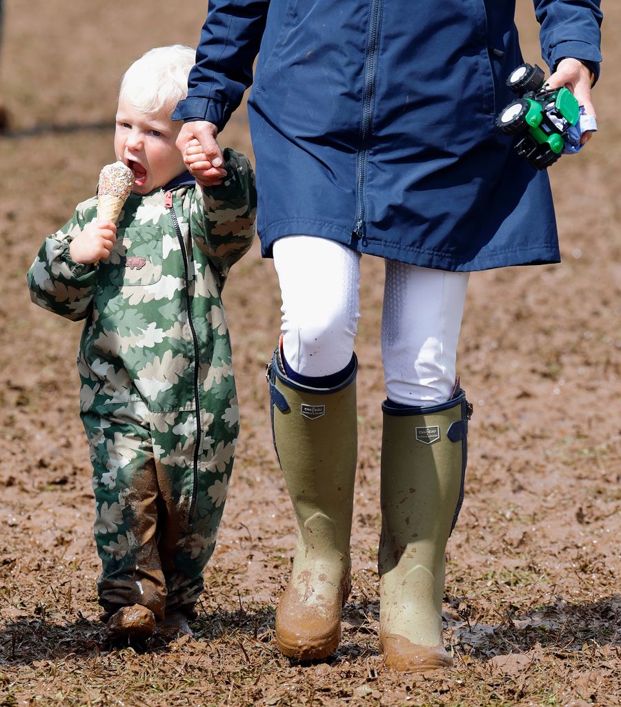 STROUD, UNITED KINGDOM - AUGUST 05: (EMBARGOED FOR PUBLICATION IN UK NEWSPAPERS UNTIL 24 HOURS AFTER CREATE DATE AND TIME) Lucas Tindall seen eating an ice cream as he and his mother Zara Tindall attend day 2 of the 2023 Festival of British Eventing at Gatcombe Park on August 5, 2023 in Stroud, England. (Photo by Max Mumby/Indigo/Getty Images)