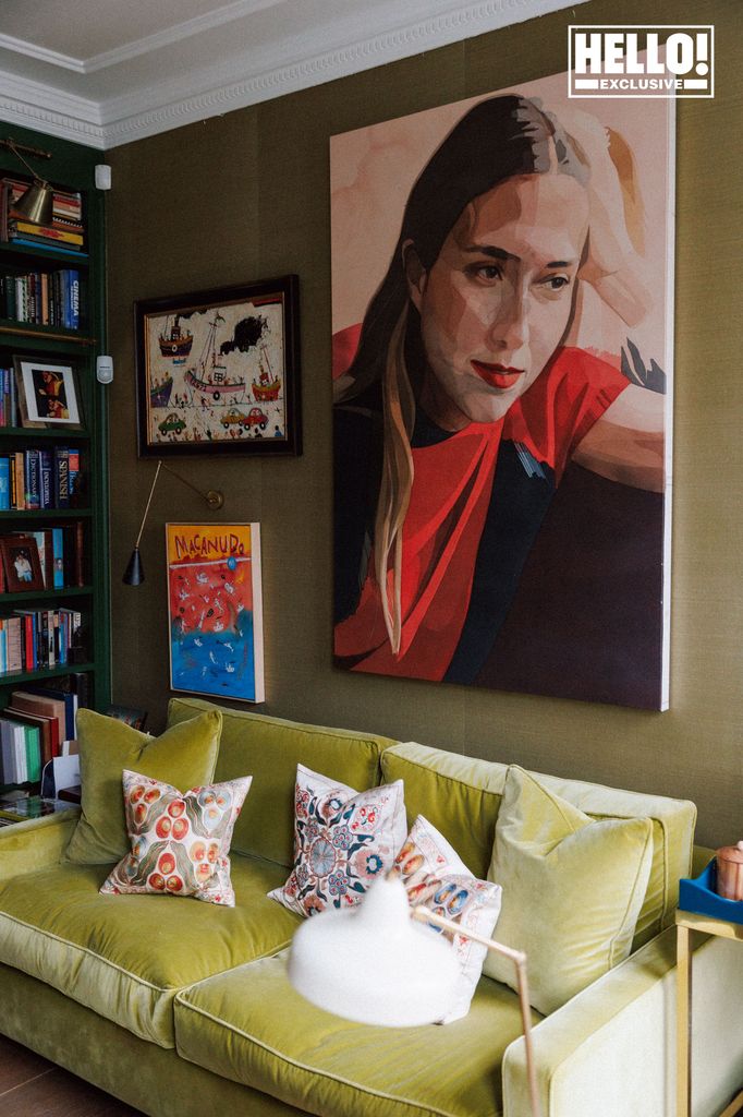 Nina Litchfield's green living room with artwork at Notting Hill home