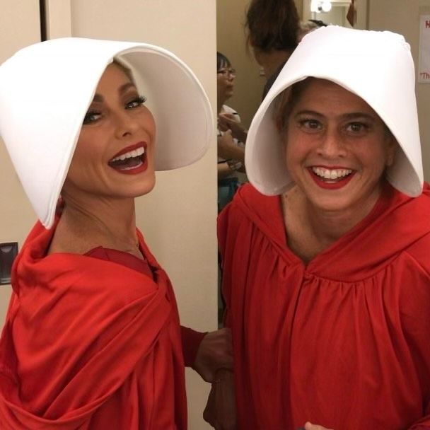 Kelly Ripa and Lori Schulweis dressed in "The Handmaid's Tale" themed costumes