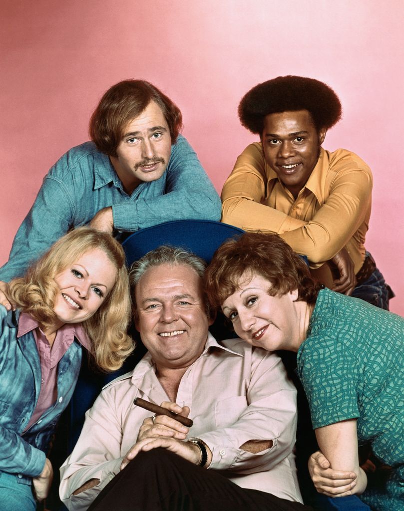 (Original Caption) All in the Family cast: Carroll O'Connor (center), Sally Struthers (left), Rob Reiner (top left), Mike Evans and Jean Stapleton.