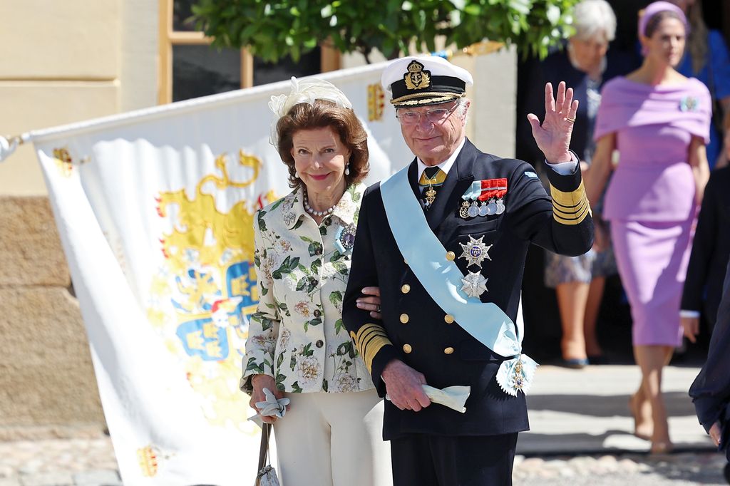 Queen Silvia of Sweden and King Carl XVI Gustaf of Sweden leave after the christening of Princess Ines of Sweden