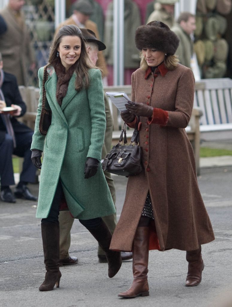 Pippa Middleton and her mother Carole The Hennessy Gold Cup at Newbury Racecourse, Berkshire, Britain