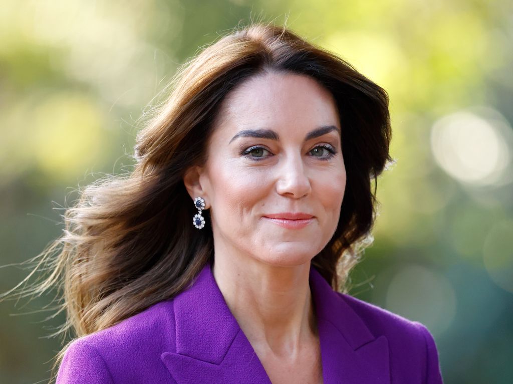 Kate Middleton in a purple outfit