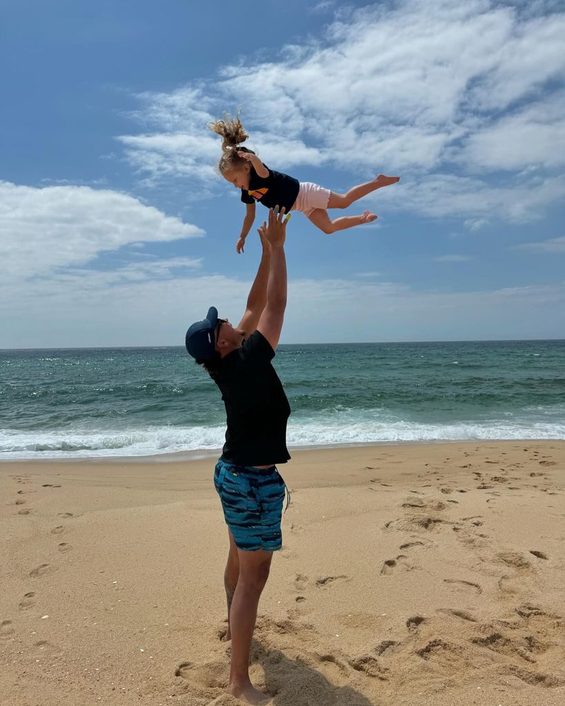 Patrick Mahomes throwing his daughter in the air