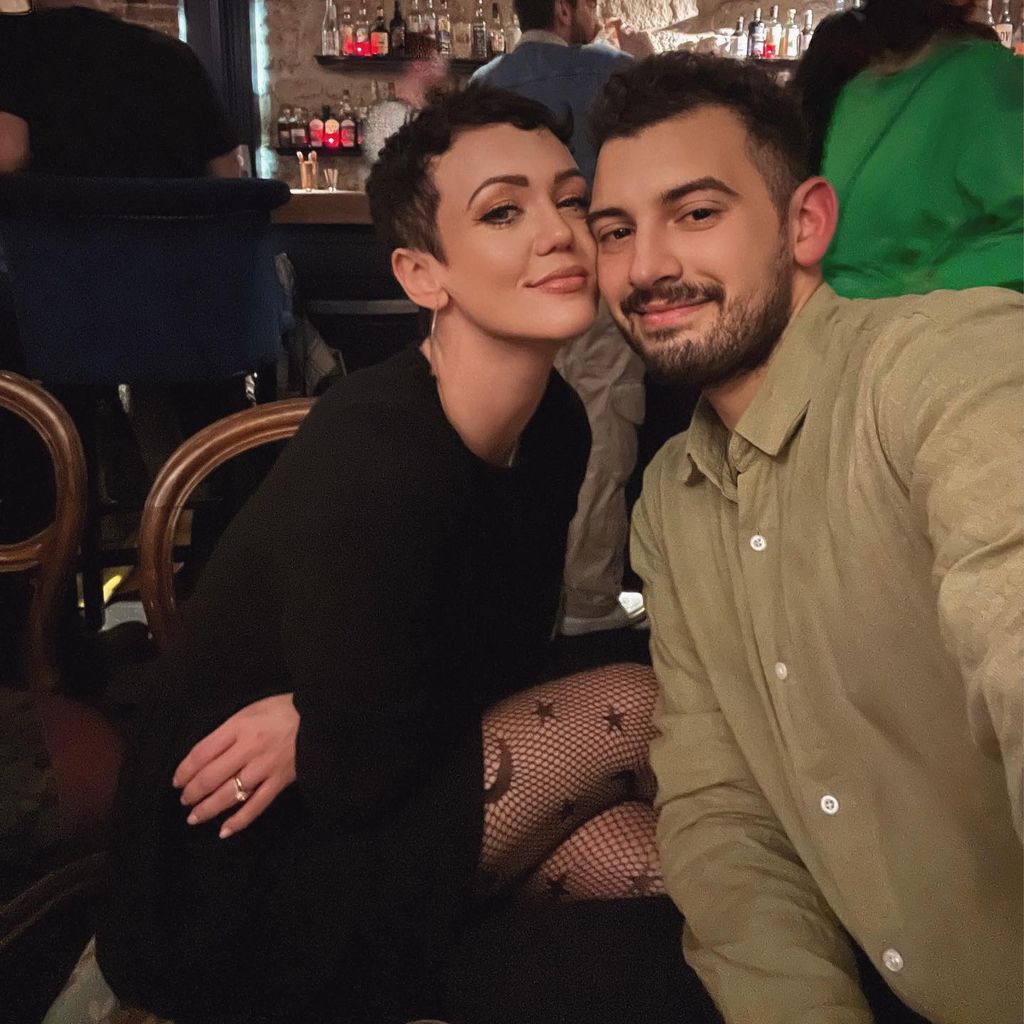 lauren at a bar with husband Max 