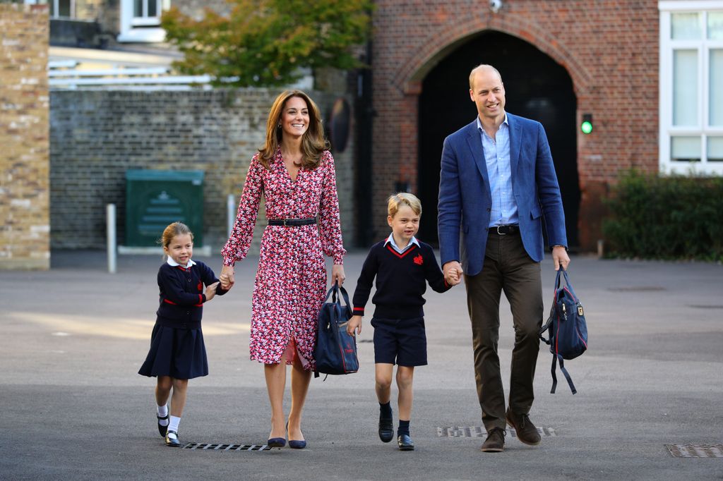 Kate Middleton and Prince William with  Princess Charlotte as she arrives for her first day of school, with her brother Prince George in 2019