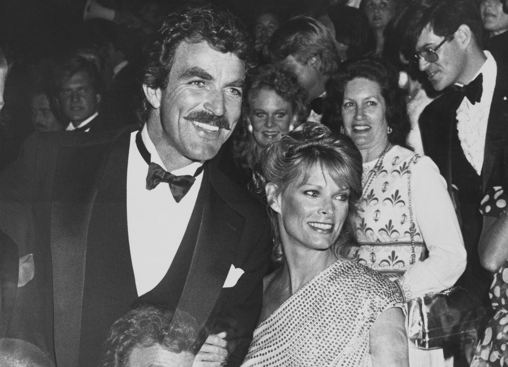 American actor Tom Selleck and his wife, American actress and model Jacqueline Ray attend the 34th Primetime Emmy Awards, held at the Pasadena Civic Auditorium in Pasadena, California, 19th September 1982. (Photo by Frank Edwards/Fotos International/Archive Photos/Getty Images)