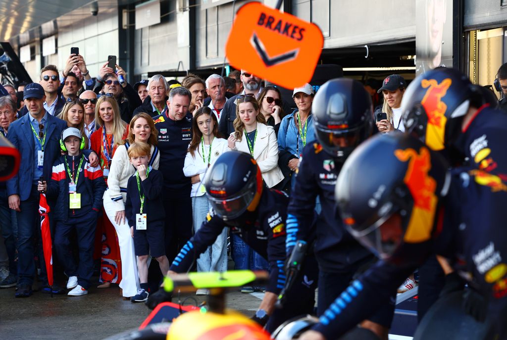 Oracle Red Bull Racing Team Principal Christian Horner shows family, Geri Horner, Montague Horner, Olivia Horner and Bluebell Halliwell the Oracle Red Bull Racing team practicing pitstops prior to the F1 Grand Prix of Great Britain at Silverstone Circuit 