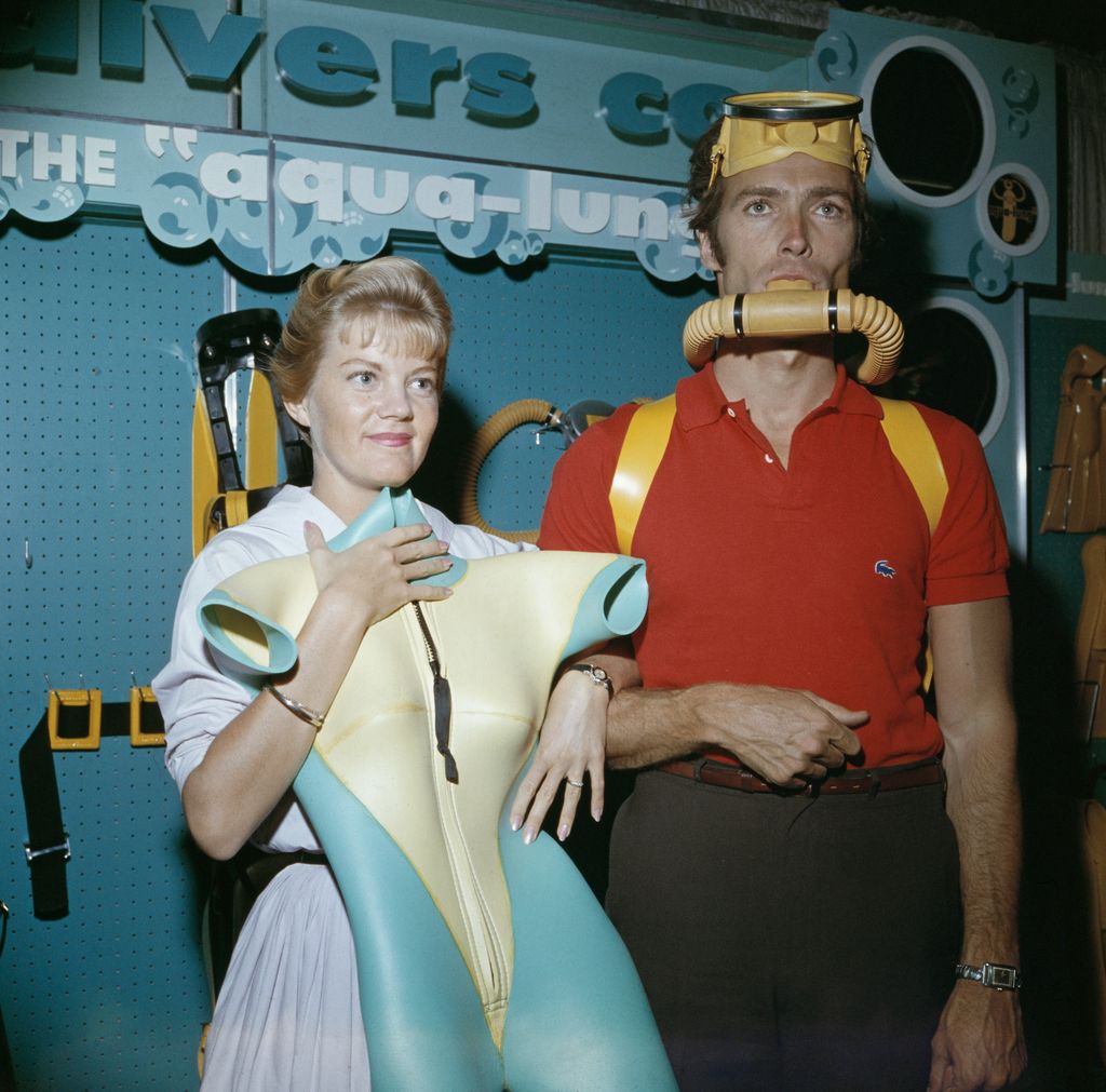 American actor Clint Eastwood and his first wife Maggie Johnson shopping for scuba diving equipment, circa 1960