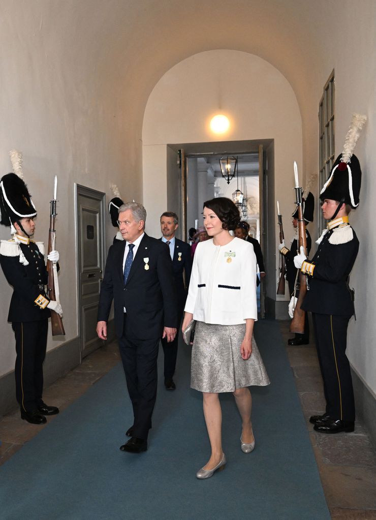 Finland's President Sauli Niinisto and his wife Jenni Haukio  arrive for the ceremony for the 50th anniversary of King Carl XVI Gustaf's accession to the throne 