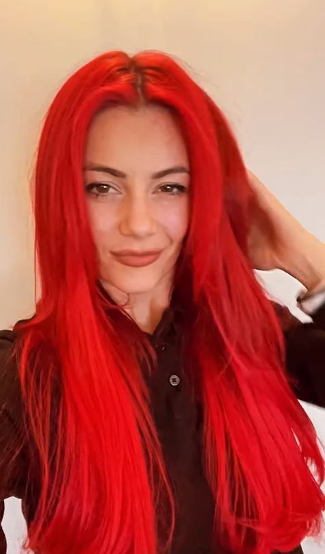 Dianne Buswell with bright-red hair