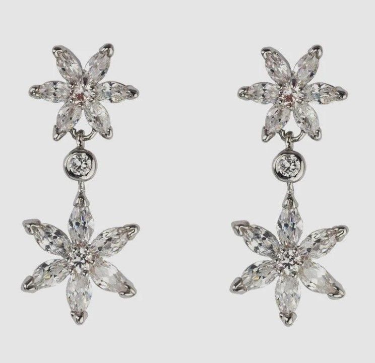 Kate wore the 'Double Daisy Drop Earrings' by Butler & Wilson