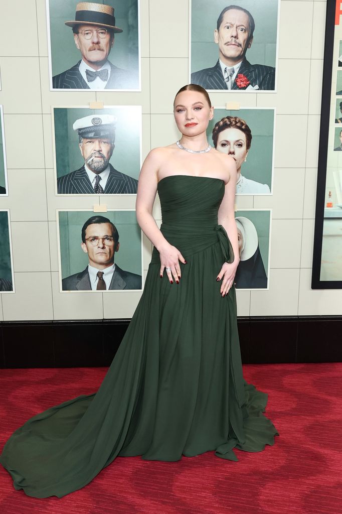 Mia Threapleton stuns in an emerald green strapless gown with ruched detailing and a dramatic train at The Phoenician Scheme New York premiere, styled with £300,000 worth of Boucheron diamond jewellery.