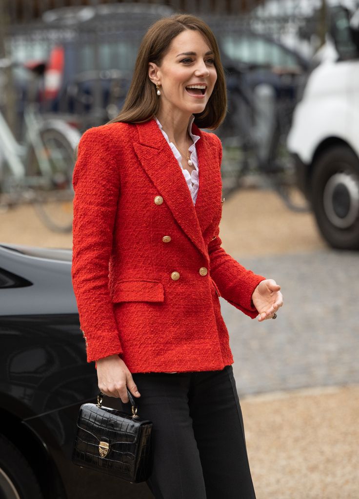Princess Kate clutching her Aspinal of London handbag