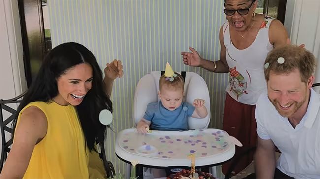 archie in high chair on birthday with meghan harry and doria 