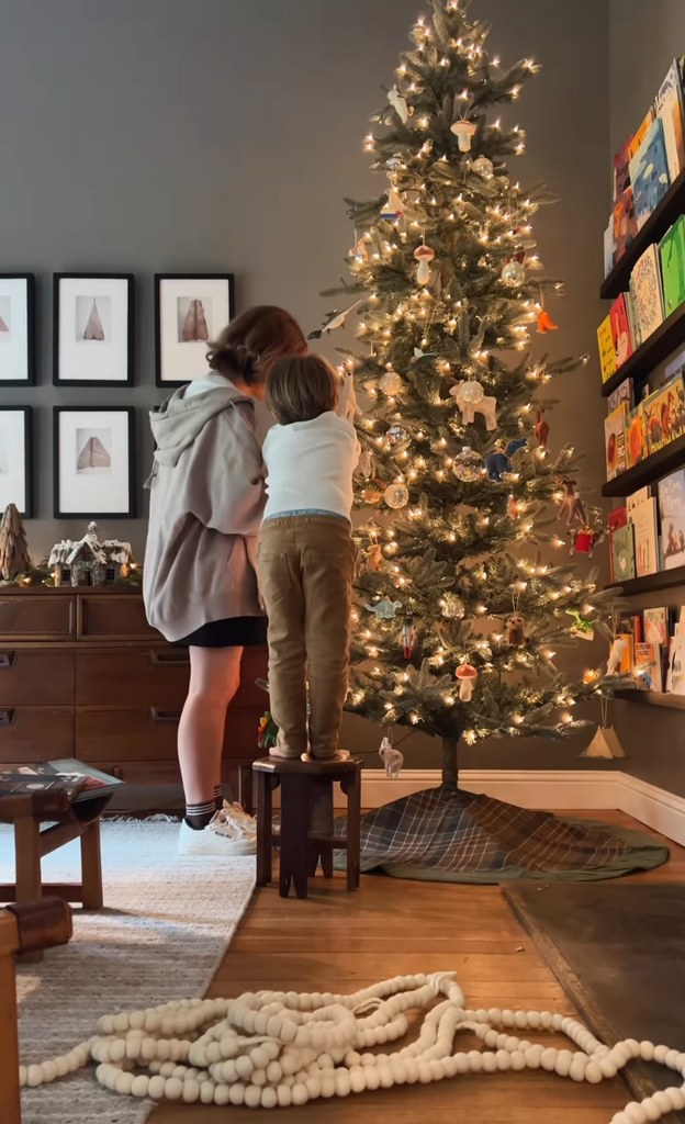 Still of video shared by Joanna Gaines on Instagram November 2023 where her son Crew and one of her daughters are assembling a Christmas tree in his bedroom.