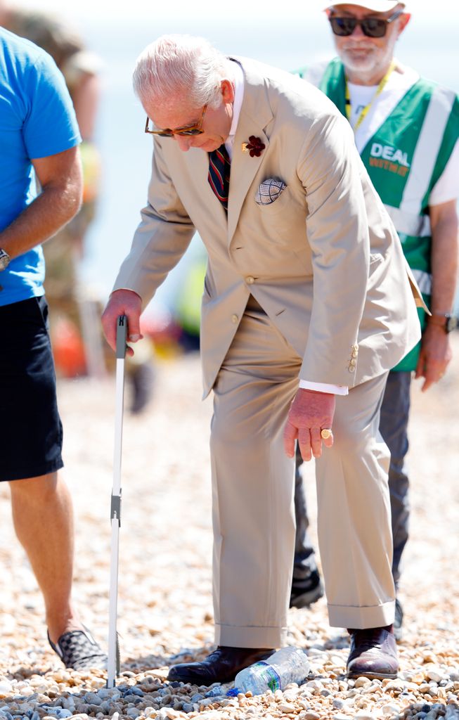 King Charles III takes part in a litter picking session