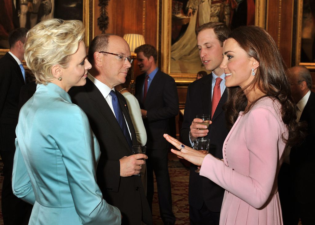 Prince William, Duke of Cambridge and Catherine, Duchess of Cambridge chat to Prince Albert ll of Monaco and Princess Charlene 