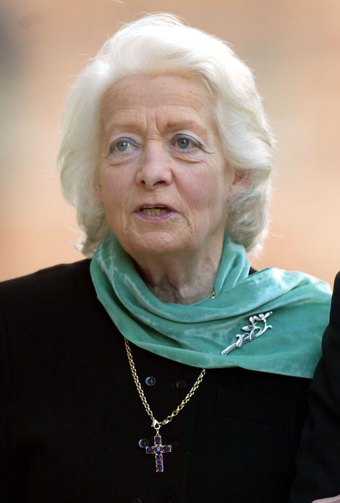Frances Shand Kydd in a black outfit and green scarf