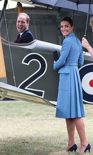 Prince William in an aeroplane with Kate Middleton beside him