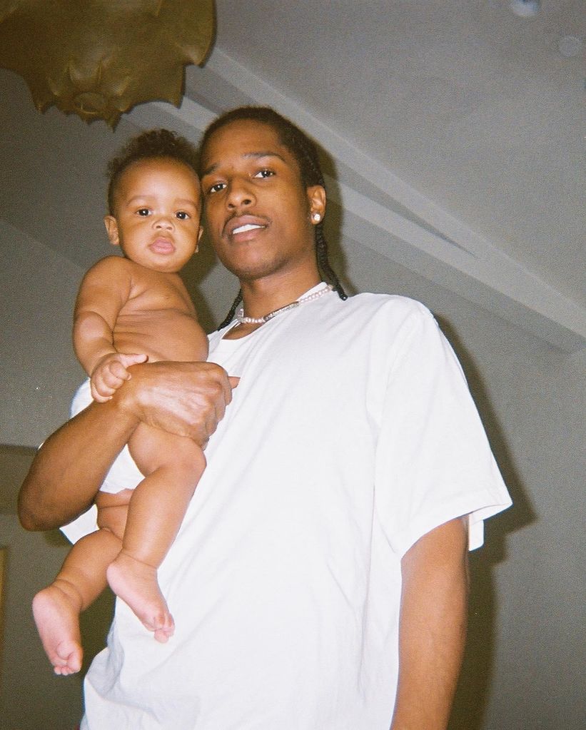 ASAP Rocky holding baby son