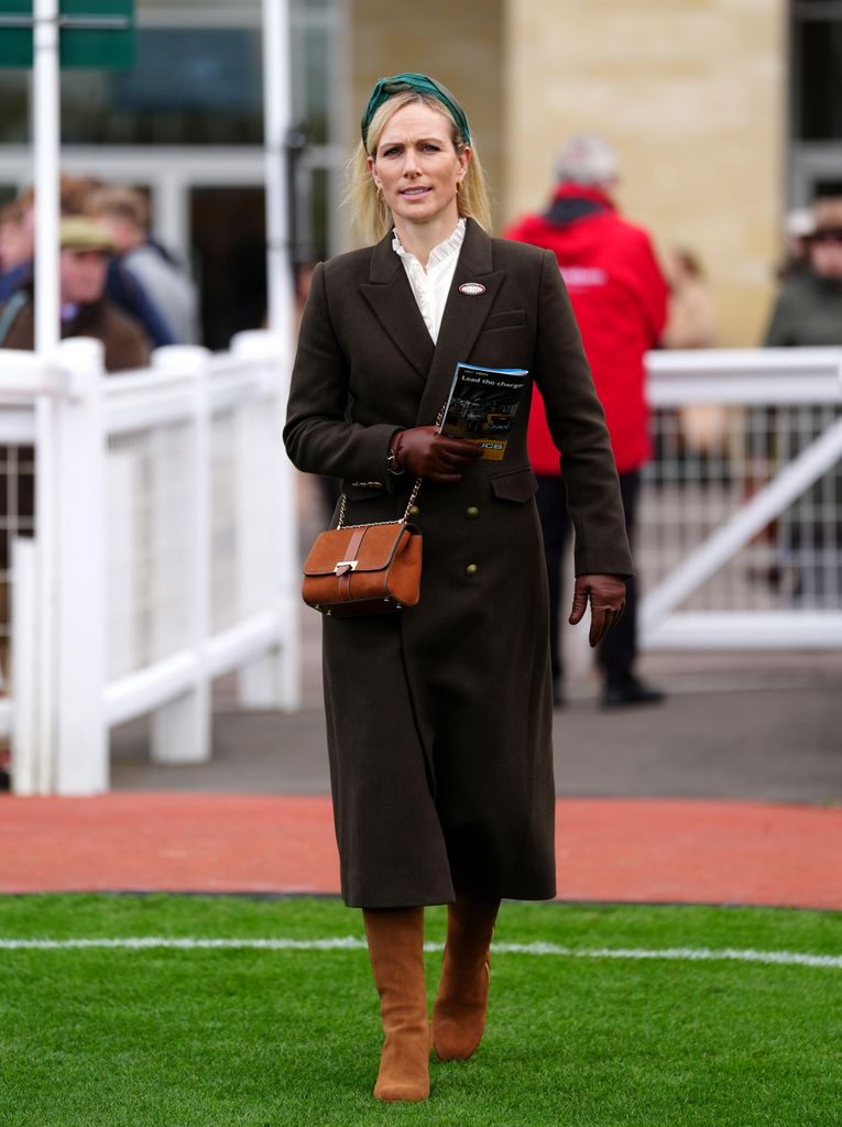 Zara Tindall at races in chocolate brown coat and boots