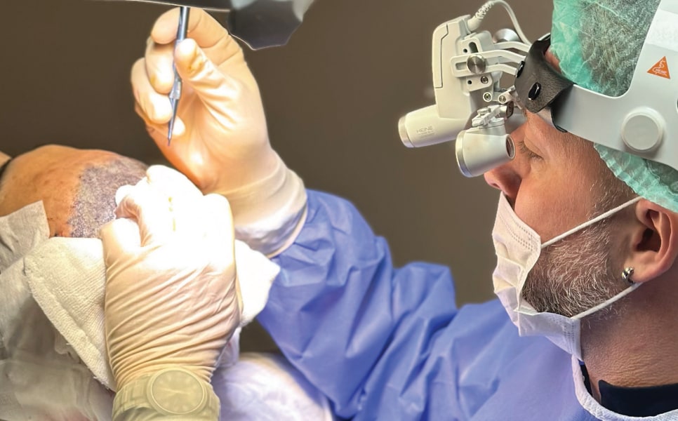 MD Mehmet Ziroğlu performs hair transplant