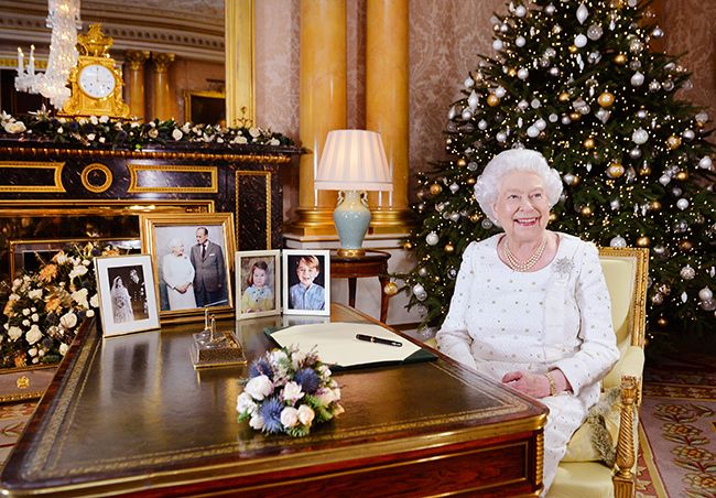 The Queen sits at a desk in the 1844 Room at Buckingham Palace, after recording her Christmas Day broadcast in 2017