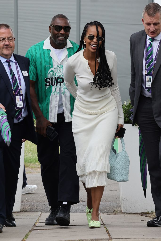 Idris Elba and Sabrina Dhowre Elba attend day fourteen of the Wimbledon Tennis Championships at All England Lawn Tennis and Croquet Club on July 16, 2023 in London, England.