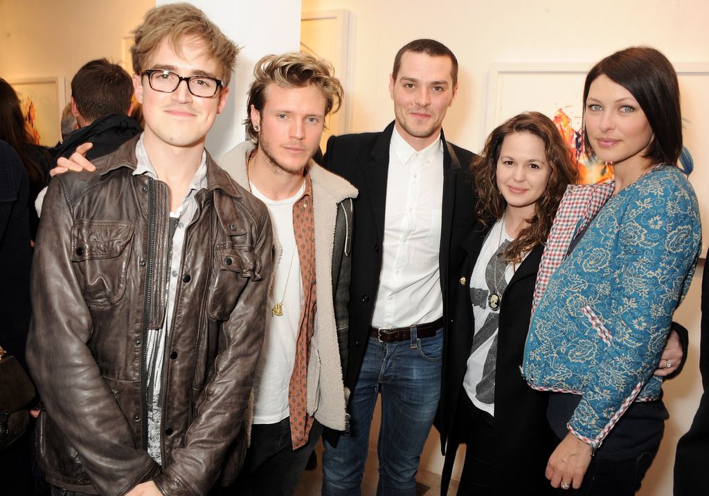 Tom Fletcher, Dougie Poynter, Matt Willis, Giovanna Falcone and Emma Willis in line