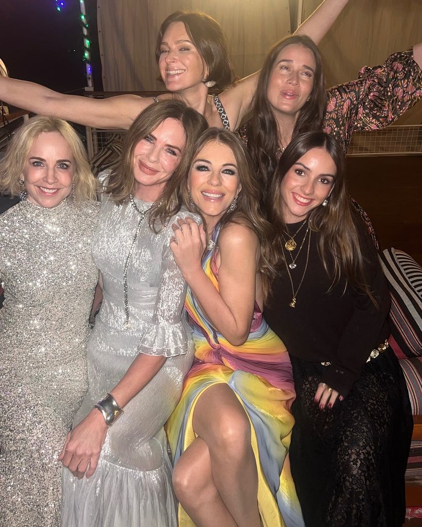 group of women celebrating on boat 