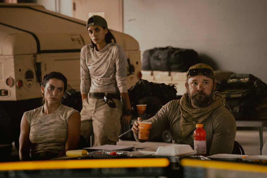 group of military soldiers in air hanger