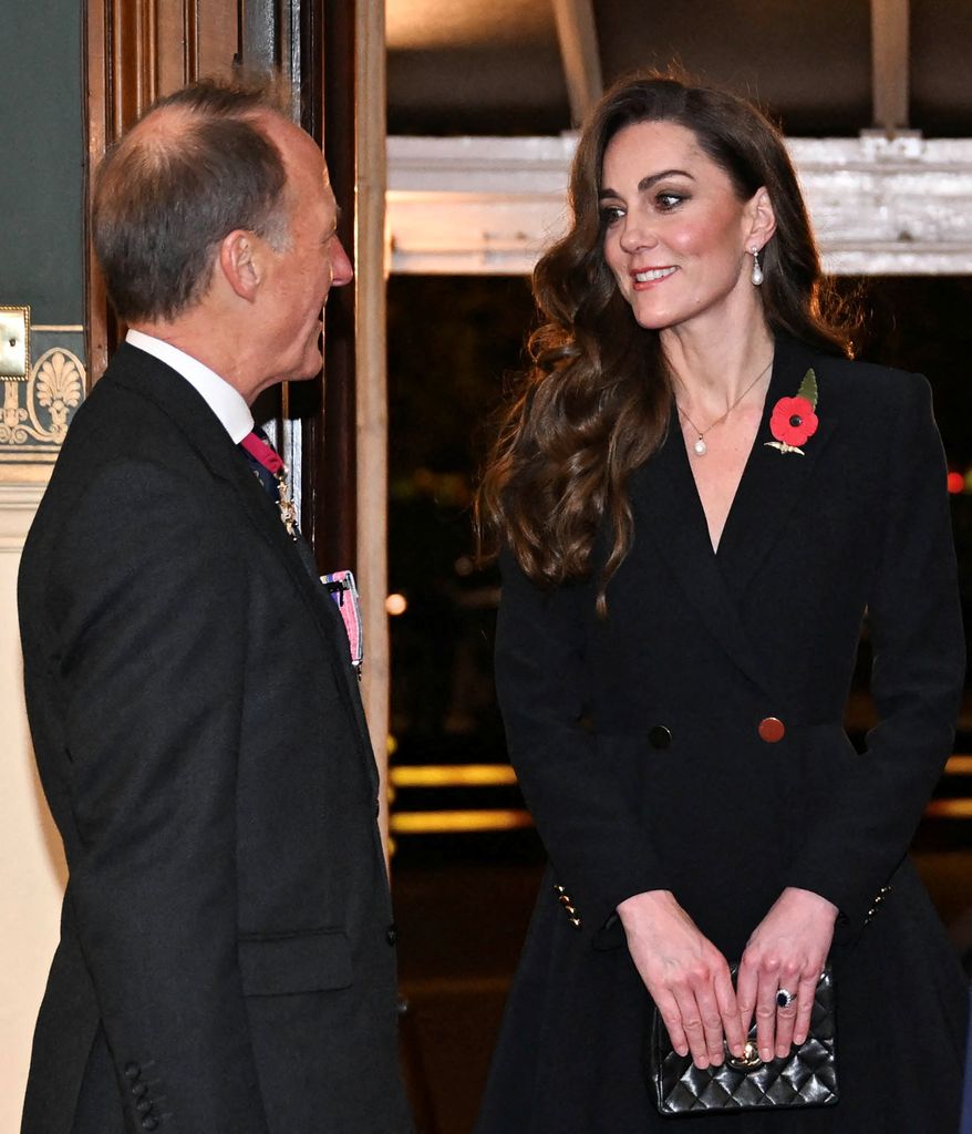 Britain's Catherine, Princess of Wales (R) arrives to attend "The Royal British Legion Festival of Remembrance" ceremony