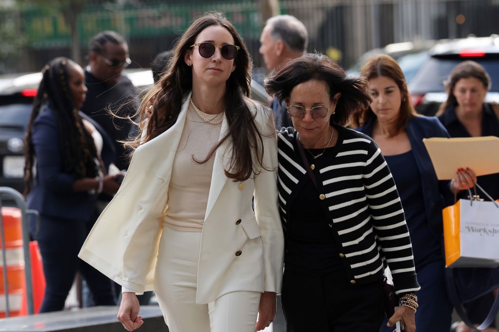 Charlie Javice (left) arrives for her sentencing at court on September 29, 2025 in New York City. Javice was convicted of defrauding JPMorgan Chase out of $175 million through her college financial-aid platform, Frank