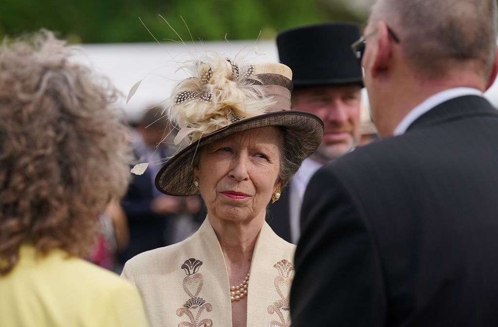 Princess Anne speaking with guests