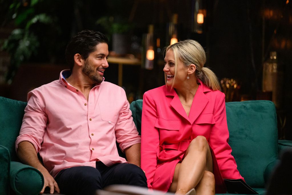 Alyssa and Duncan sit on sofa at the commitment ceremony on MAFS Australia