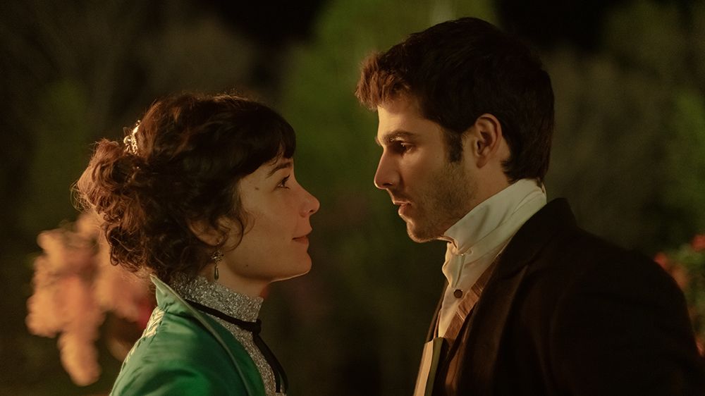 Nadia de Santiago and Álvaro Mel staring at one another as Elena and Santiago