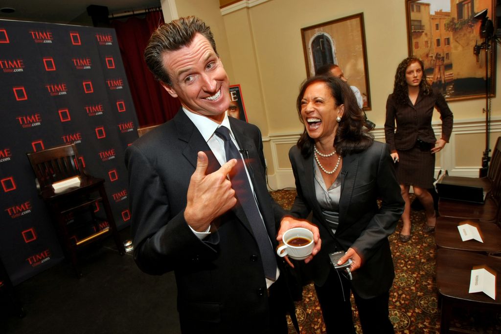 an Francisco Mayor Gavin Newsom and Kamala Harris laugh at a Time magazine breakfast for up and coming politicians as part of the Democratic National Convention, Tuesday Aug. 26, 2008, in Denver, Colorado