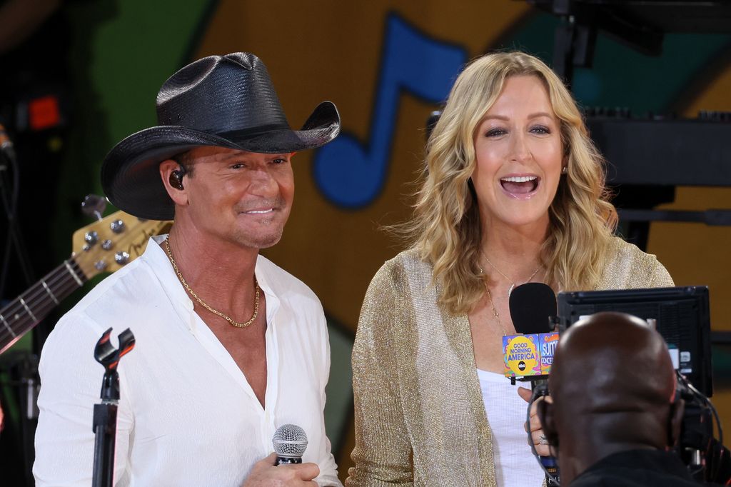 Tim McGraw (L) and Lara Spencer onstage during ABC's "Good Morning America" at Rumsey Playfield, Central Park on August 25, 2023