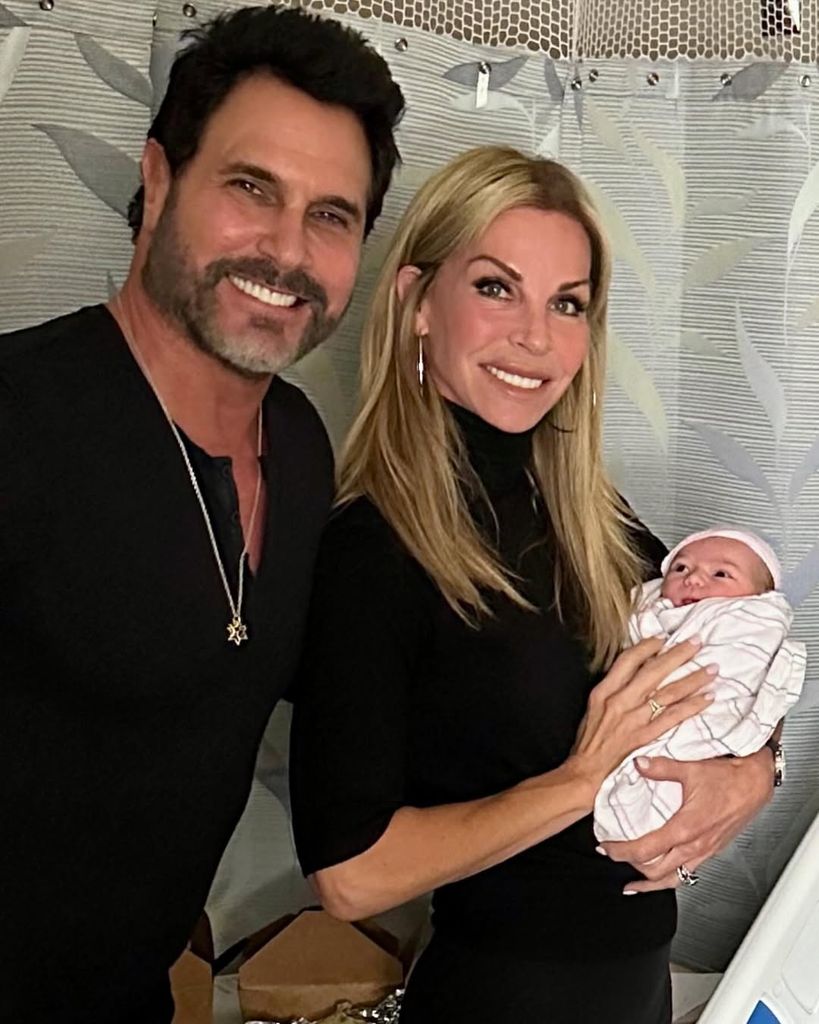 Don Diamont and Cindy Ahbuehl hold their grandson August