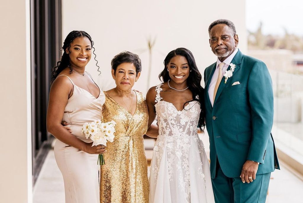 Adria, on the left, with bride Simone and their parents