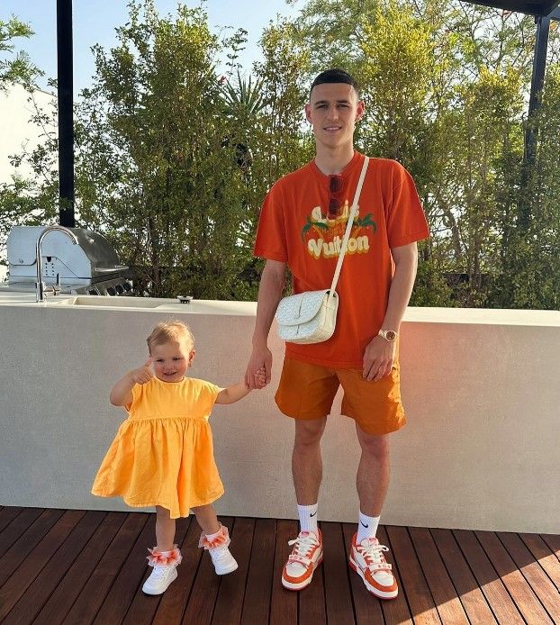 Phil Foden with his daughter