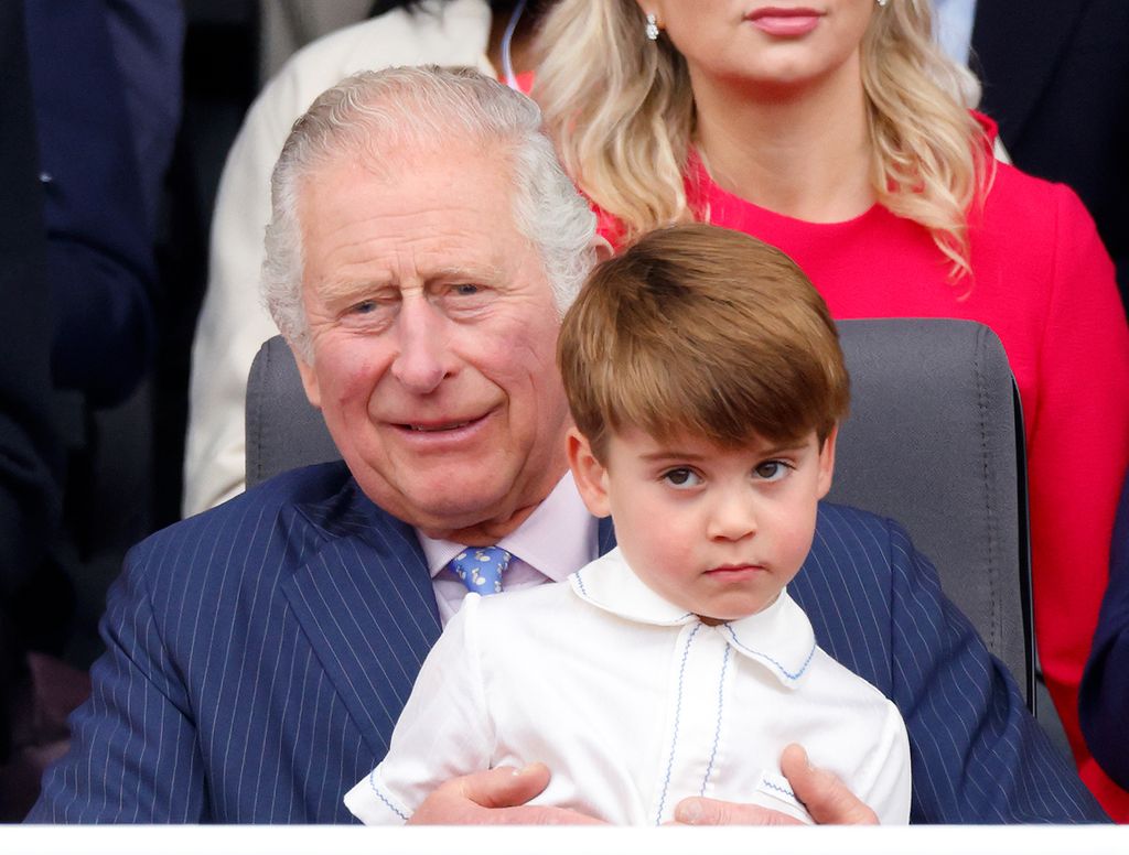 Prince Louise and King Charles sitting together