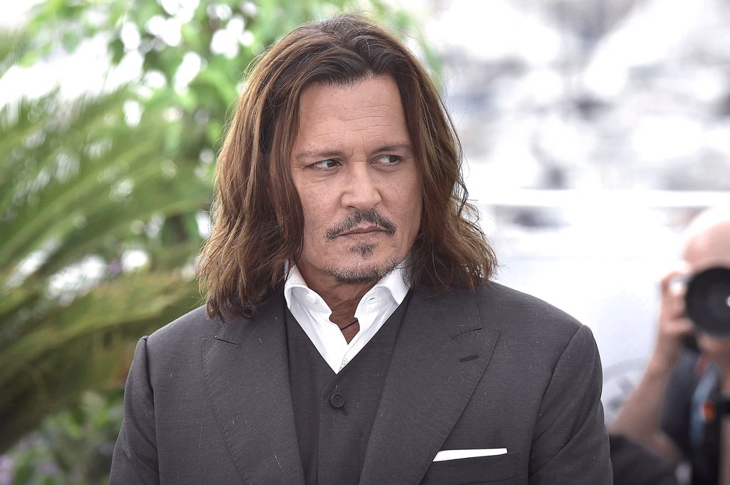 Johnny Depp seen hobbling on crutches and using medical boot amid ...