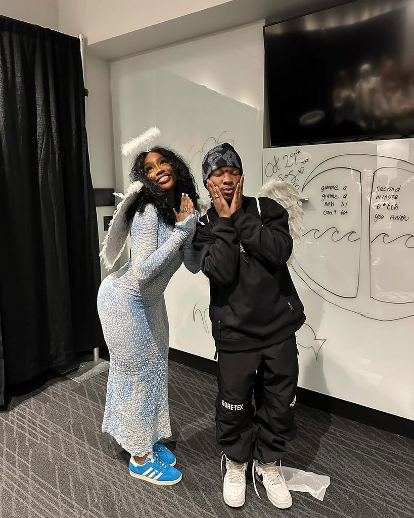 D4vd and SZA pose for a photo backstage after the completion of the US leg of the SOS Tour, shared on Instagram