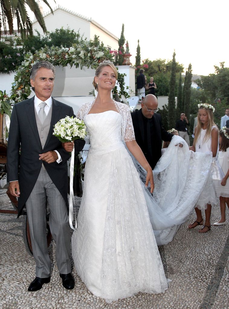 Tatiana Blatnik and her stepfather Atilio Brillembourg arrive at the Cathedral of Ayios Nikolaos (St. Nicholas) for her wedding to Prince Nikolaos of Greece on August 25, 2010 in Spetses, Greece