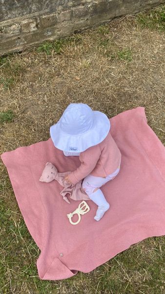 alex jones baby annie enjoying the sunshine all pink ensemble