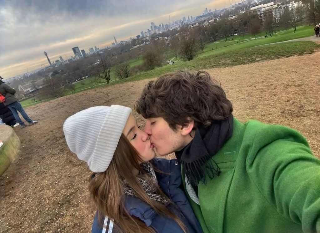 Kingston Rossdale and his girlfriend Lola Albert take a selfie mid kiss while exploring a park, shared on Instagram