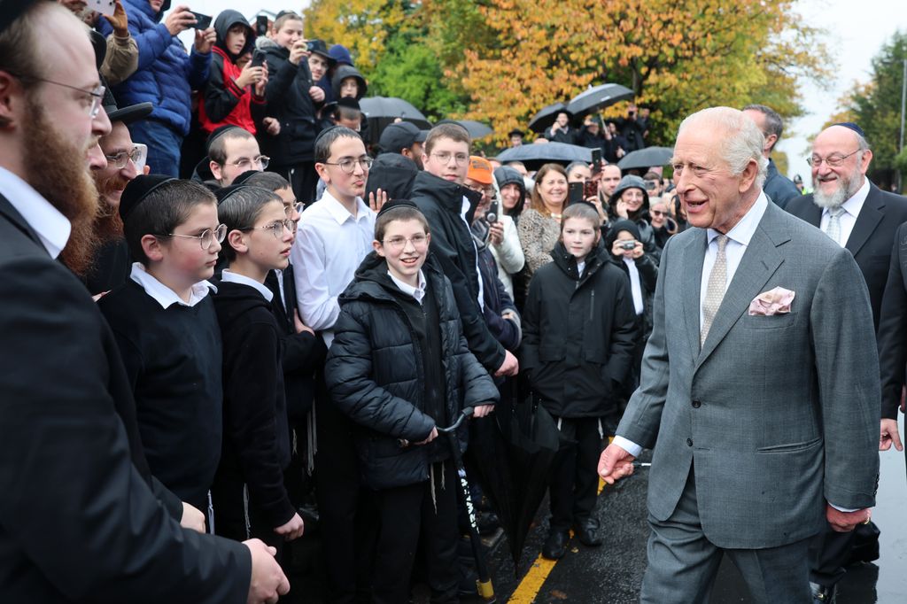 King Charles III meets members of the community during a visit to Heaton Park Hebrew Congregation Synagogue 