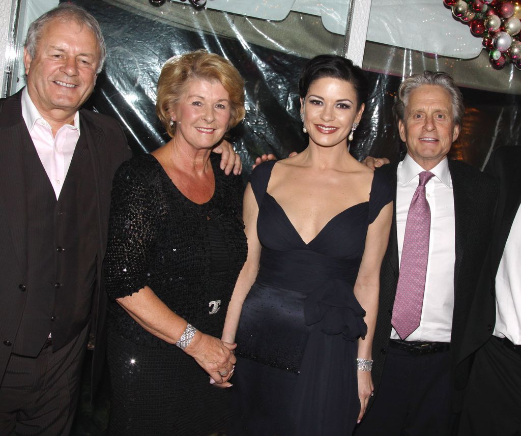 Catherine Zeta-Jones with her parents and her husband Michael Douglas 